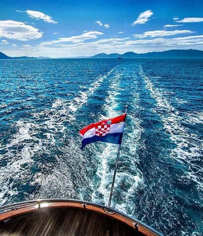 Croatian flag on the stern of a sailing yacht